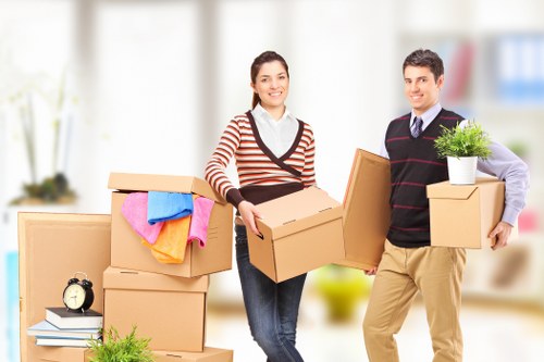 Moving large furniture through an Ilford property with care