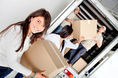 Careful loading of student items for transport in Ilford