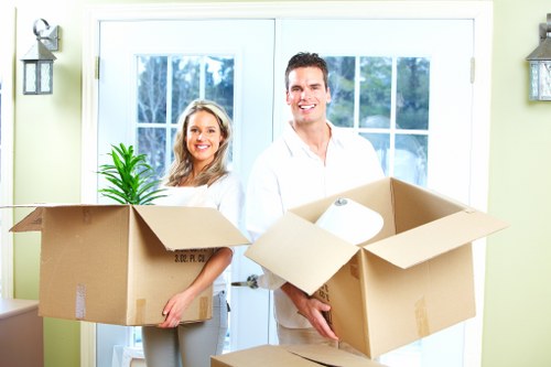 Loading furniture into a van for a move in Ilford