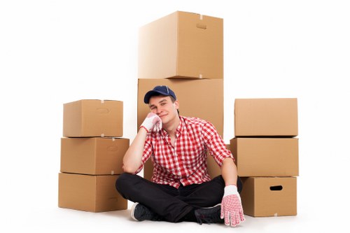 Removal staff wearing PPE during a safe moving operation